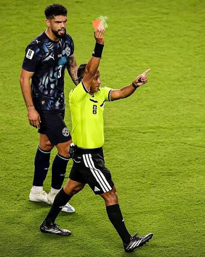 AFTER REVIEW! NUMBER 10, PARAGUAY, COVER HIS MOUTH! DECISION IS RED CARD!